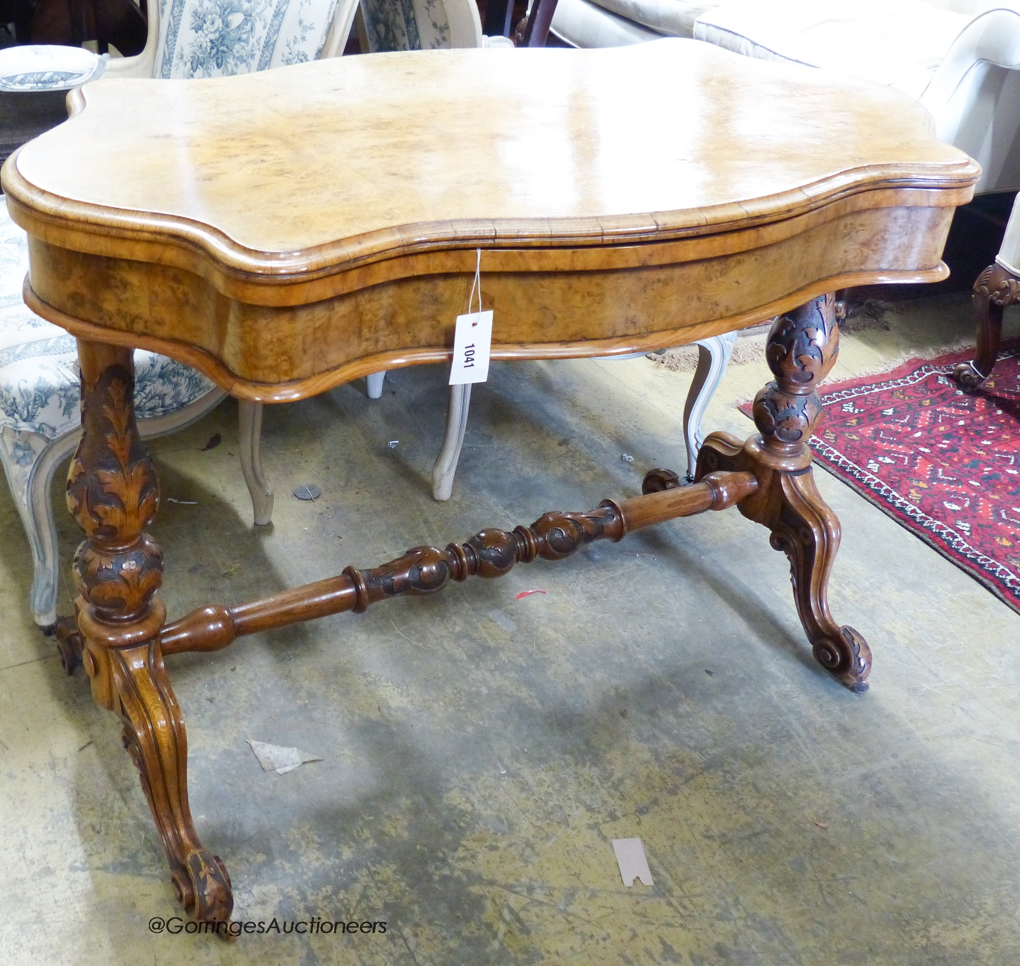 A Victorian pollard oak folding card table of rectangular serpentine form (faded) W-108, D-58, H-76cm.